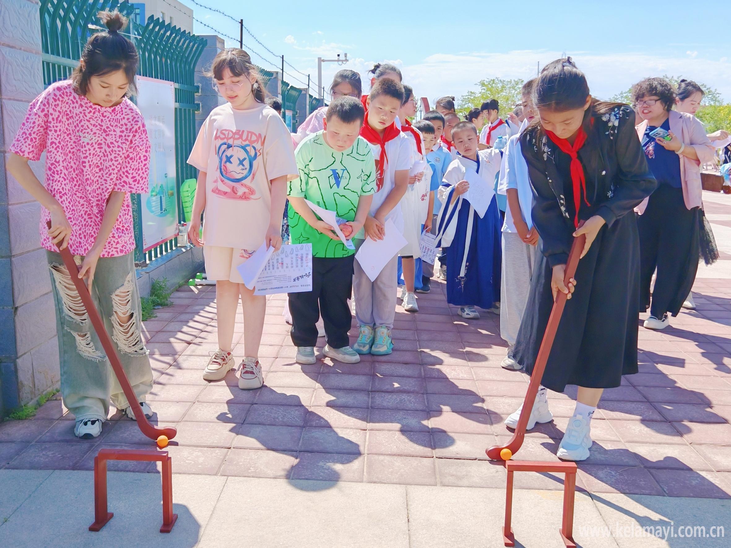 5月31日,白碱滩区五新社区与市第十六小学,晨光幼儿园开展儿童节活动